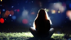 girl-sitting-outside-at-night-300x171.jpg