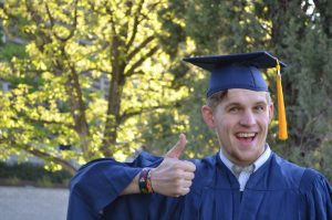 graduation_man_cap_gown_education_university_college_school-867306-1544823140130-300x199.jpg