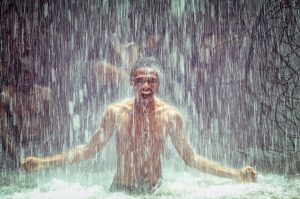 man-under-waterfall-2150164_1920-300x199.jpg