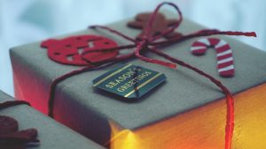 close-up-photo-of-a-gift-box-wrapped-with-red-string-1661951-300x169.jpg