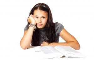 woman-in-black-t-shirt-leaning-on-white-table-in-front-of-41943-300x200.jpg