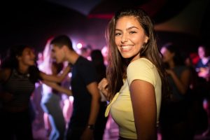 woman-standing-near-group-of-people-1449791-300x200.jpg