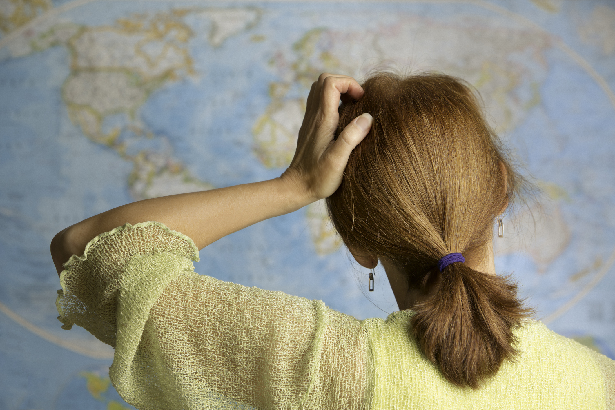 A woman Scratching Her Head