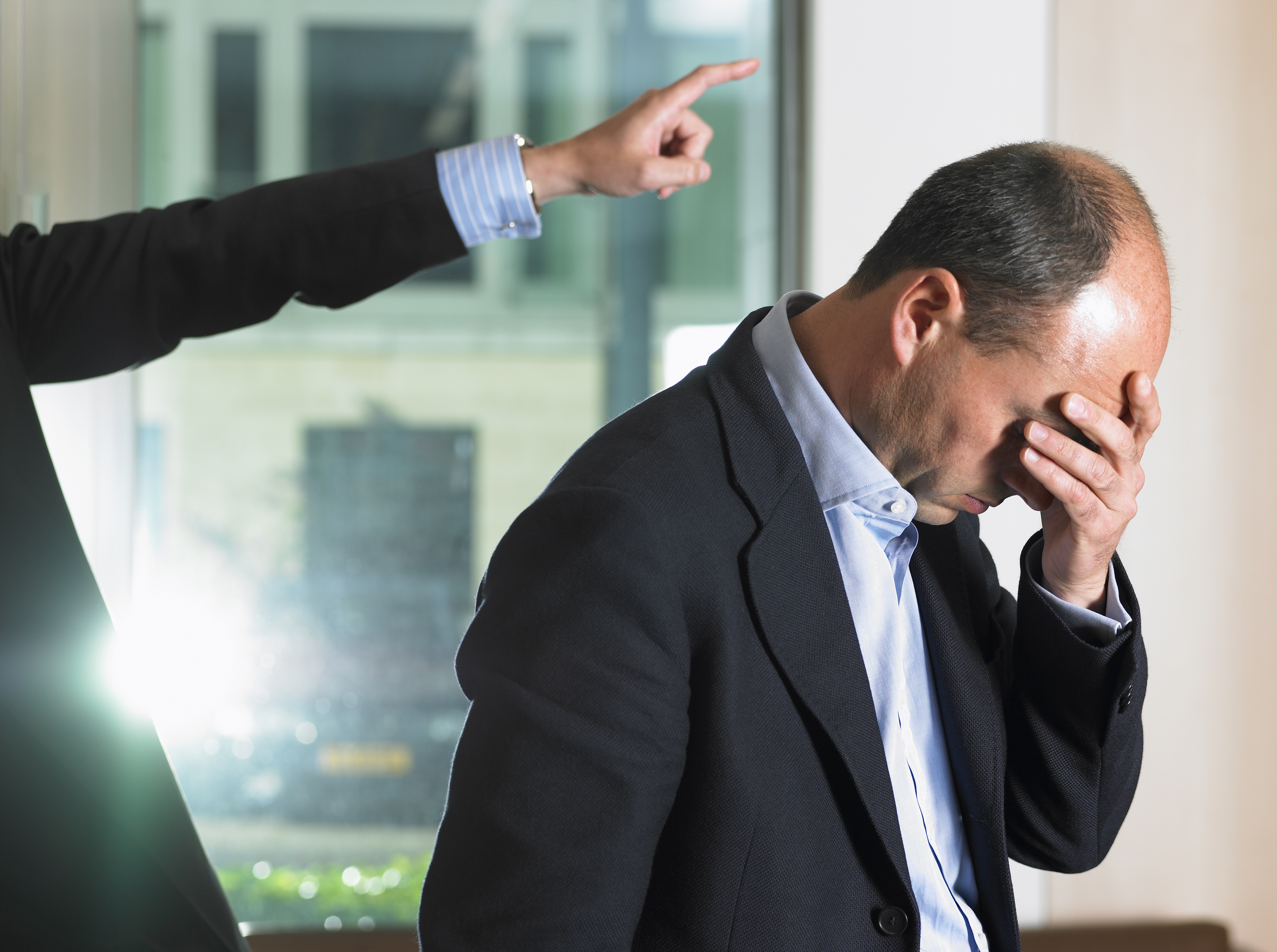 Man getting fired from his job.